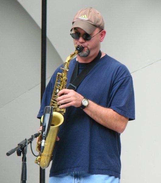 Doug Carmichael of 3ology playing saxophone at Rhythm on the River in Longmont